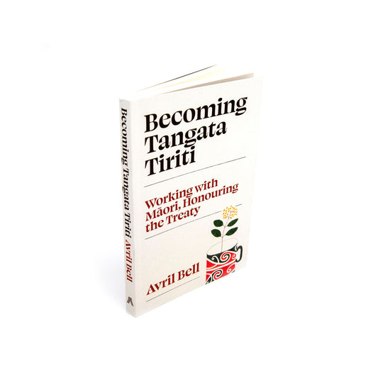 The book 'Becoming Tangata Tiriti' by Avril Bell, shown standing upright at a slight angle on a clean white background. The cover is off-white with black and red text, and a small red, green, and black floral emblem in the lower right corner.